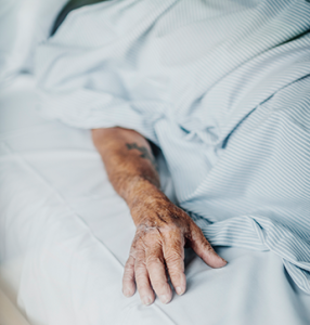 Patient in hospital bed