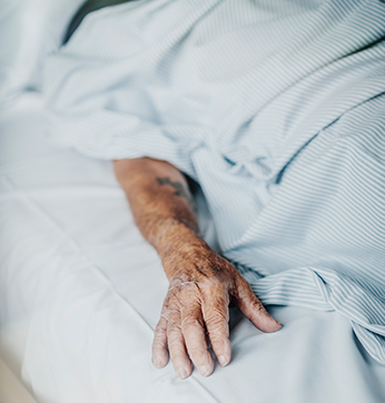 Patient in hospital bed